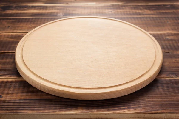 Planche à découper pizza à fond de planche en bois rustique — Photo