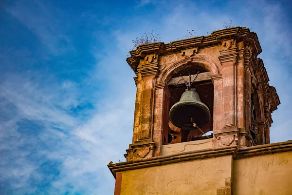 Ancestral bell tower and bell in old church