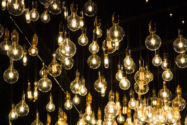 Shiny lamps with beautiful lights, with night background