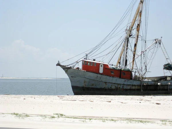 Beached Shrimp boat after a hurricane.