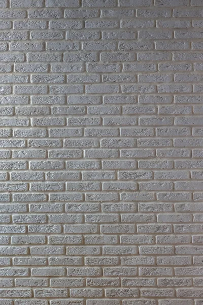 Modern white brick wall vertical texture