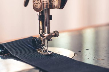 old antique sewing machine in robotic condition_