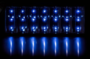 bright white fuzzy lights glow and shine on a dark background_