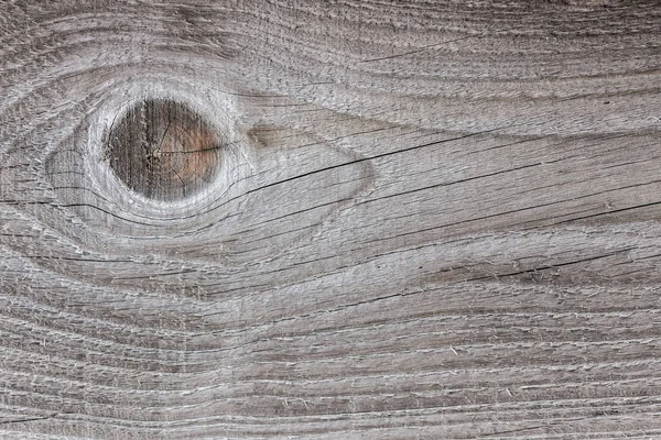 Konsistens av en gammal träskiva med sprickor i grå och bruna col — Stockfoto