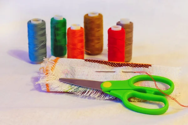 Still-life of needlework: cloth, scissors, thread, needle_ — Stock fotografie