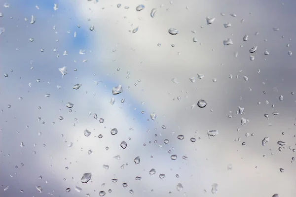 Drops of rain on clear glass, far away blurred sky_ — 图库照片