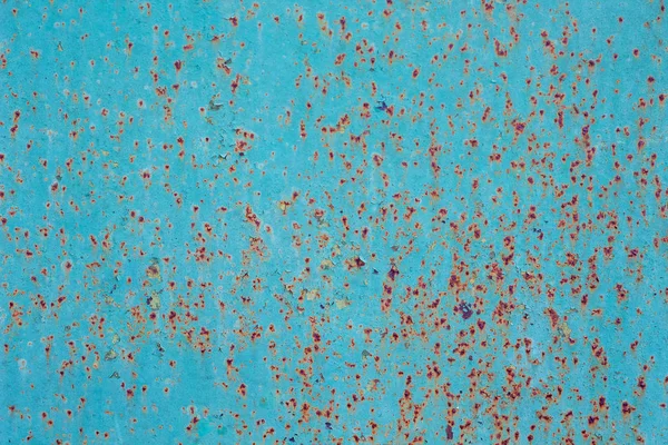 Old blue metal sheet with shabby paint - background or texture_ — ストック写真