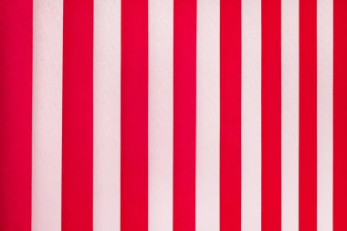 Texture of white and red stripes. Vertical blinds on  window_
