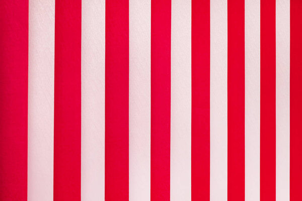 Texture of white and red stripes. Vertical blinds on  window_