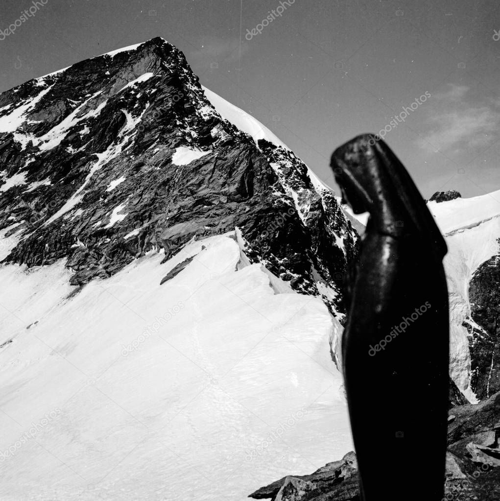 Monte Rosa mountain group, Statue of the Holy Virgin Mary, on top of Punta Giordani, 4046 msl summit, view of the Vincent Pyramid 4215 msl, vintage image