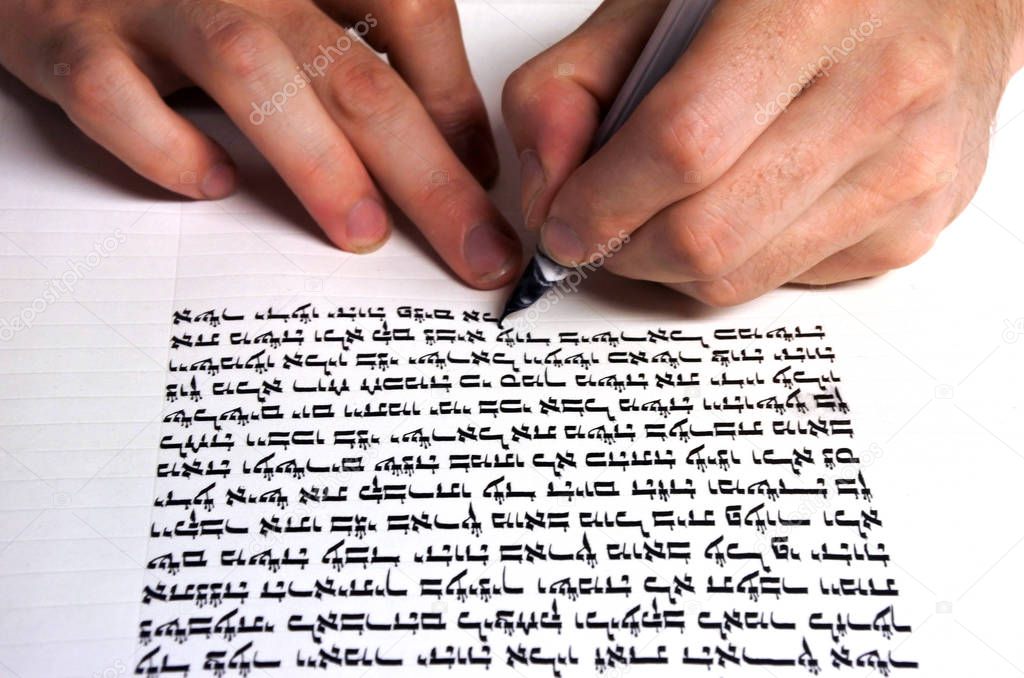 Sofer writes a sefer Torah 