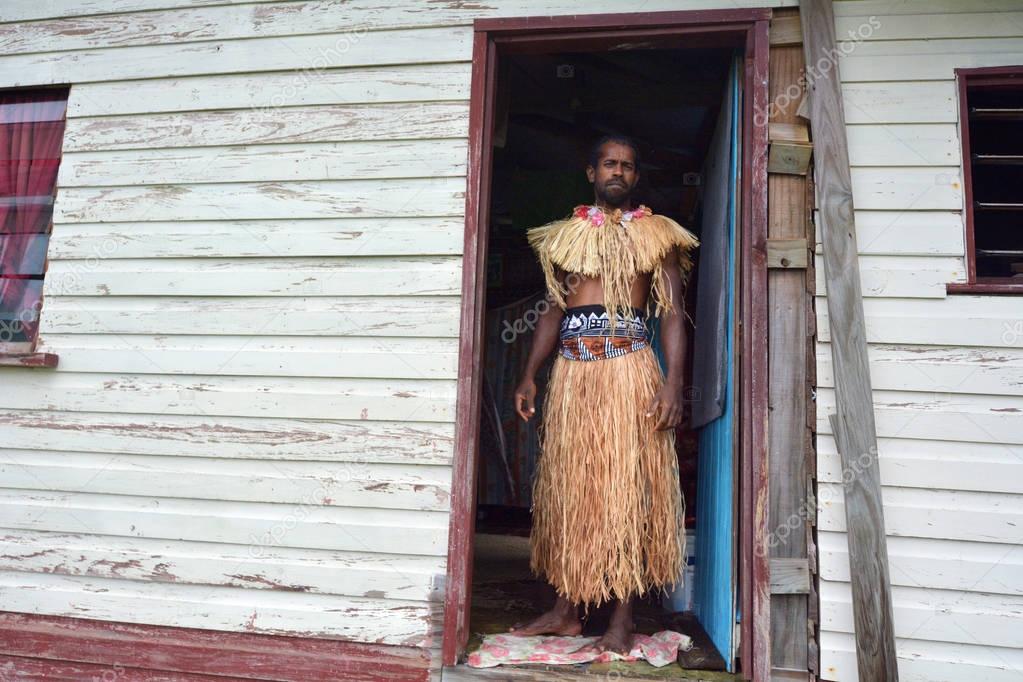 Indigenous Fijian man dressed in traditional Fijian costume