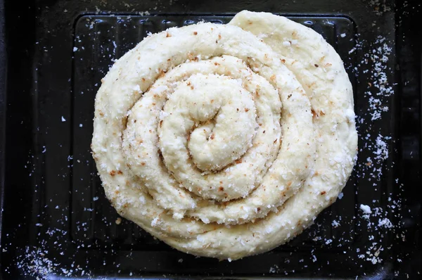 Unbaked Coconut roll. sweet coconut bread — Stock Photo, Image