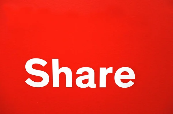 Share word isolated on red background — Stock Photo, Image