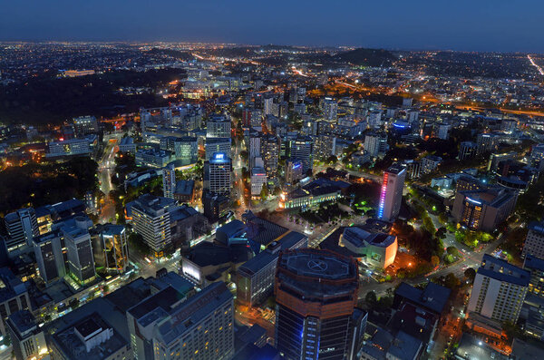 Aerial urban landscape view of Auckland city at dusk