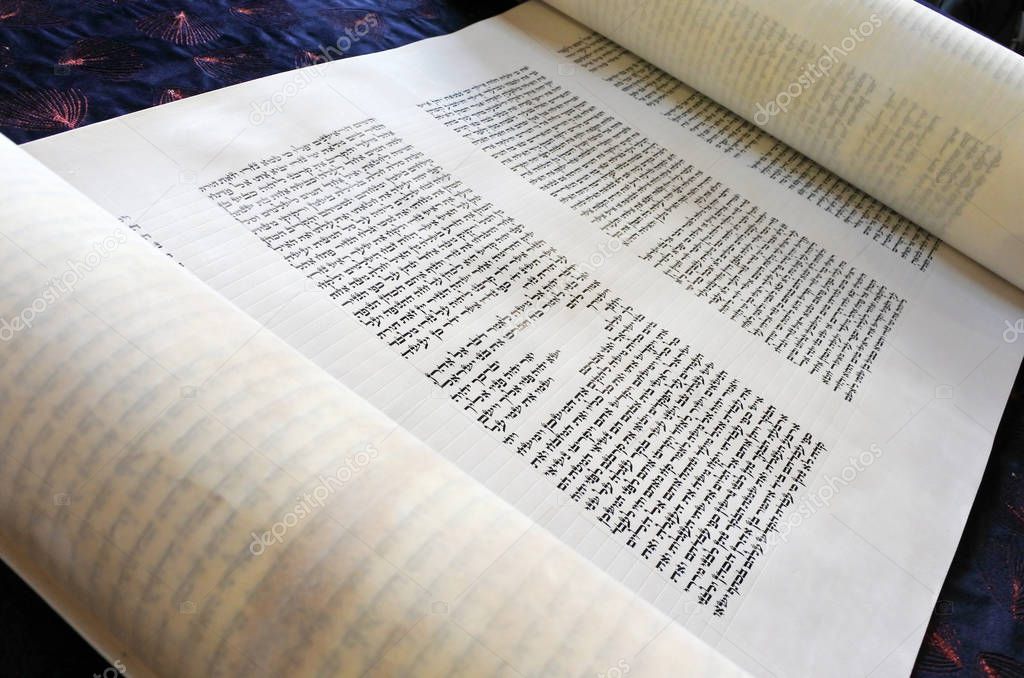Torah scroll text book.  the Oral Torah was given to Moses at Mount Sinai, which, according to the tradition of Orthodox Judaism, occurred in 1312 BC.