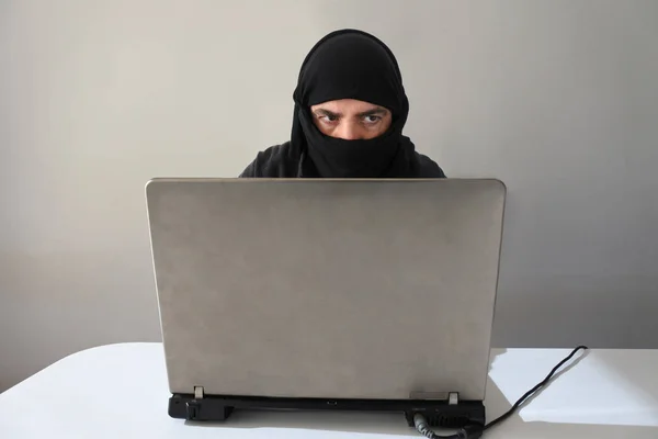 Hacker muslim terrorist attack from laptop