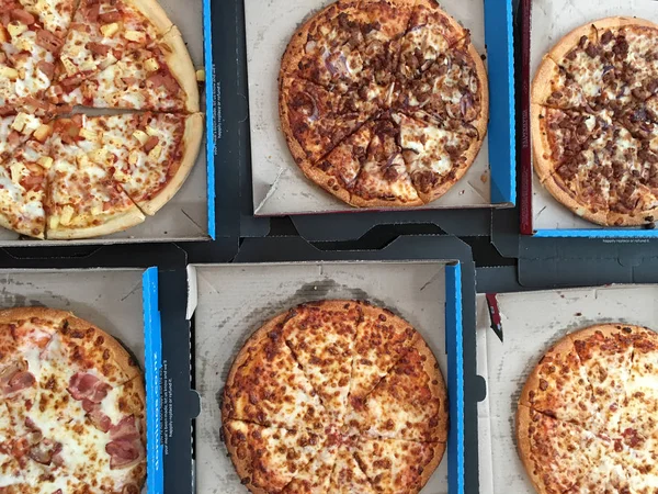 Selection of Pizza on a table — Stock Photo, Image