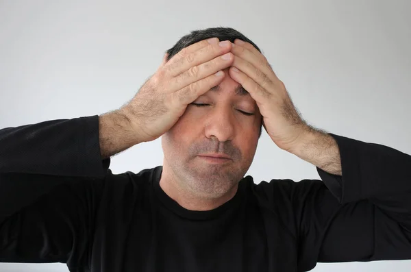 Devastated man with closed eyes has an idea — Stock Photo, Image