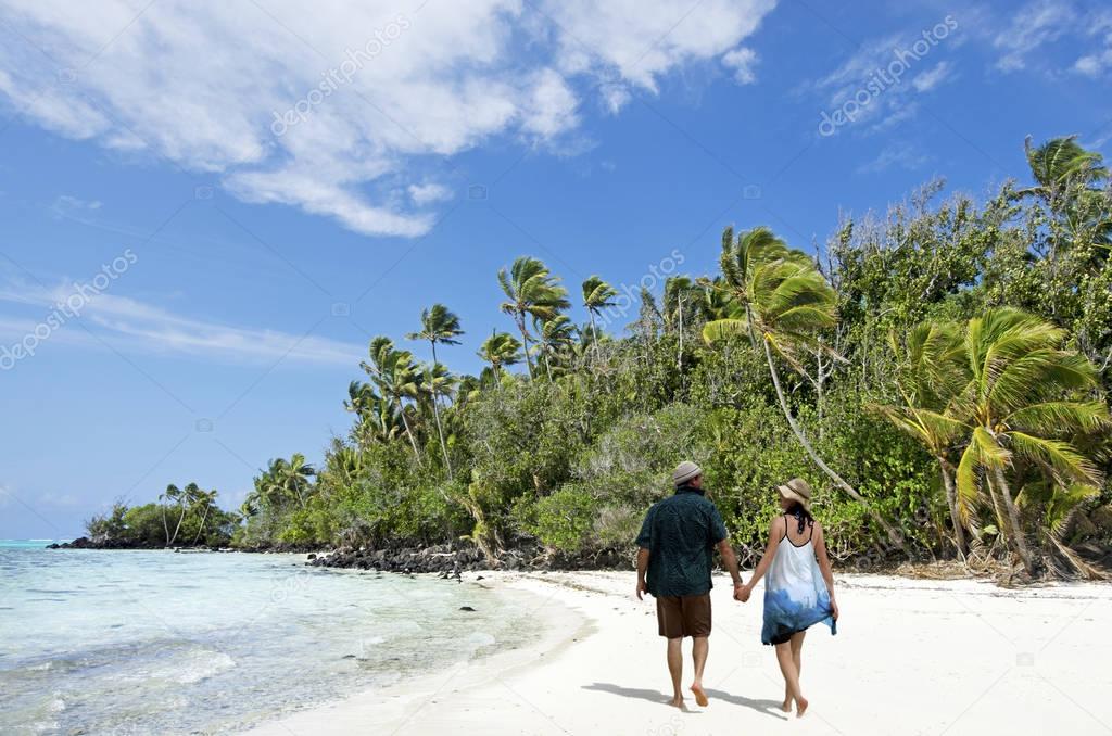 Couple Walk on Rapota Island in Aitutaki Lagoon Cook Islands