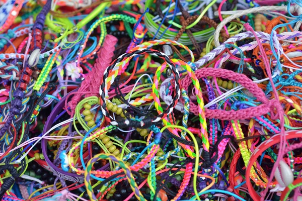 Colour bracelets hand knotted rope hand  weaving — Stock Photo, Image