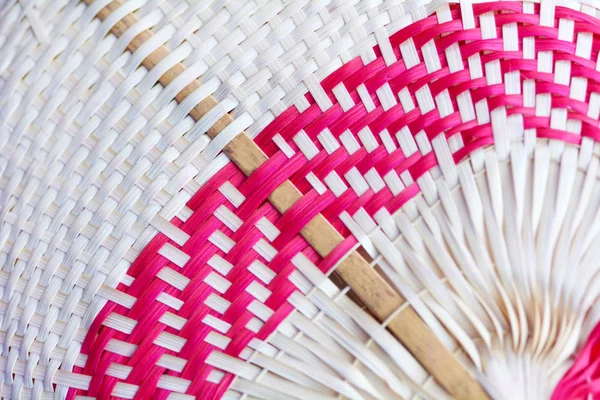 Pacific Islands woven fan close up background