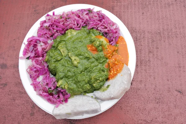 Chicken rukau dish served in a plate in Rarotonga Cook Islands — Stock Photo, Image