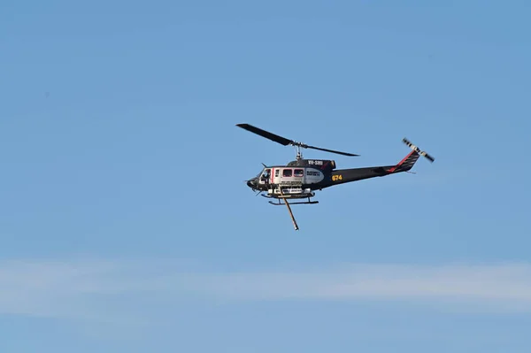 Heli-lift Helicopter over Perth Western Australia — стокове фото