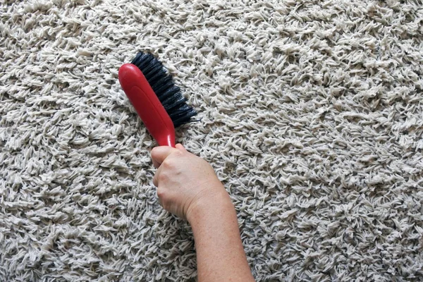 POV de persona limpiando una alfombra — Foto de Stock