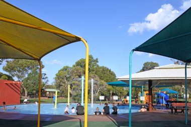 PERTH - MAR 3 2020:Visitors at Whiteman Park pool.Whiteman Park is apopular tourist destination in the Swan Valley near Perth, Westrn Australia.