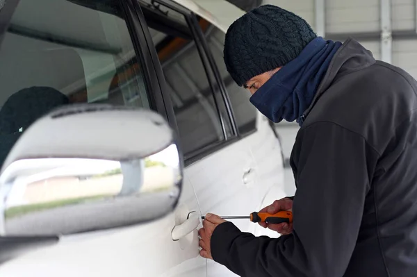 Car Theft Breaking Entering Car Using Screwdriver Open Front Door — Stock Photo, Image