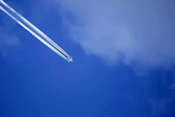 stock image Plane across the sky