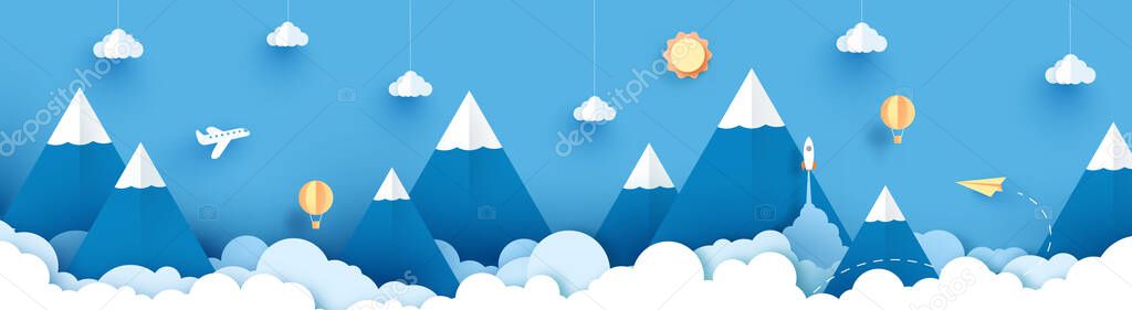 Panorama Winter landscape with paper art style and blue color. View of clouds and mountains. design with art paper and craft. Landscape with high mountains, balloons, paper plane, sun, clouds and