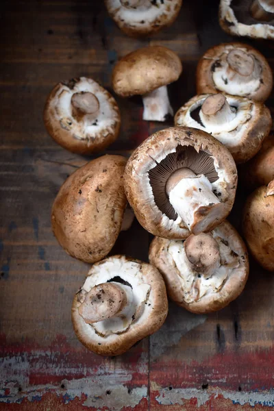 Button mushrooms in rustic farmhouse setting