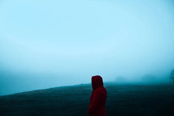 man in the fog at dawn