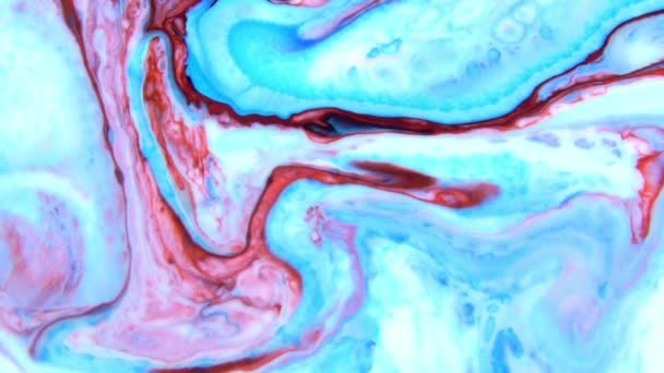 La peinture colorée liquide atténue le mélange au ralenti. Couleur liquide motifs de peinture texture vue du dessus. Surface de peinture liquide multicolore .