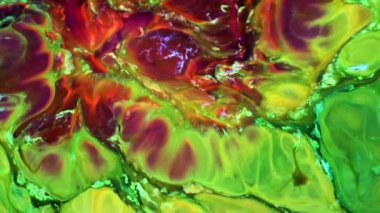 Sıvı Renkli Boya ağır çekimde patent alır. Sıvı renkli boya desenleri üst görünüm. Çok renkli sıvı boya yüzeyi.