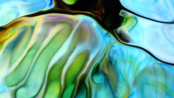 Fond abstrait avec la peinture psychédélique dans des couleurs vives colorées. Effet organique avec peinture fluide se déplaçant et glissant lentement. Tourbillons et propagation.