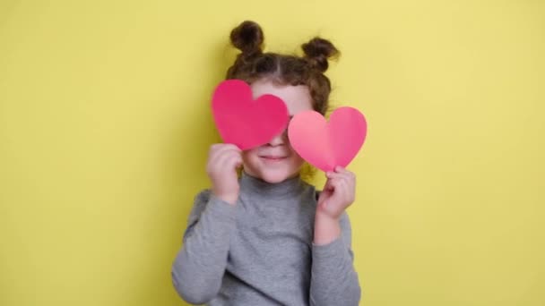 Funny Little Blogger Looking Webcam Holding Red Hearts Smiling Child — Stock Video