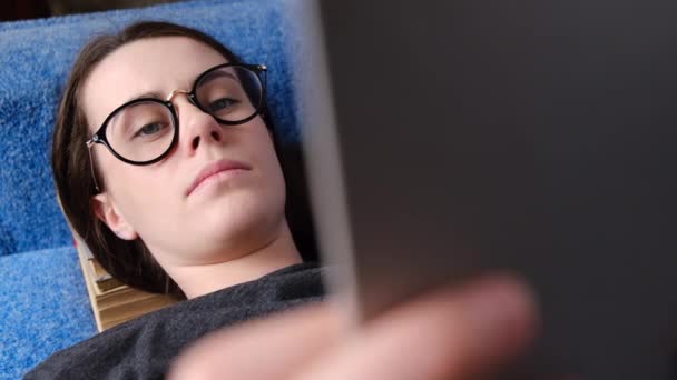 Top View Young Woman Glasses Reading Old Book Lying Cozy — Stock Video