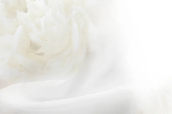 O fundo é flor clara e tecido branco tem uma ondulação suave . — Fotografia de Stock