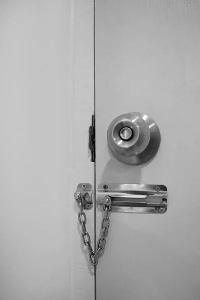 Door security chain locks style black and white and empty space for text . — Stock Photo, Image