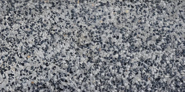 Piedra de grava lavada de textura de pared de arena o fondo de pared de arena — Foto de Stock