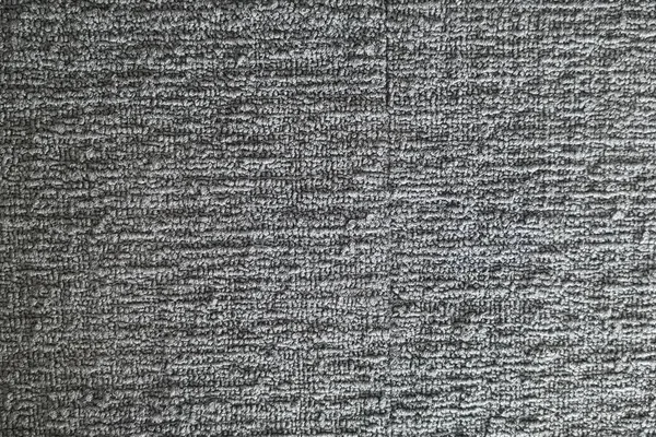 Schließen Sie den grauen Teppich.Blick von oben Sehen Sie die klaren Details. Kunststoff. — Stockfoto