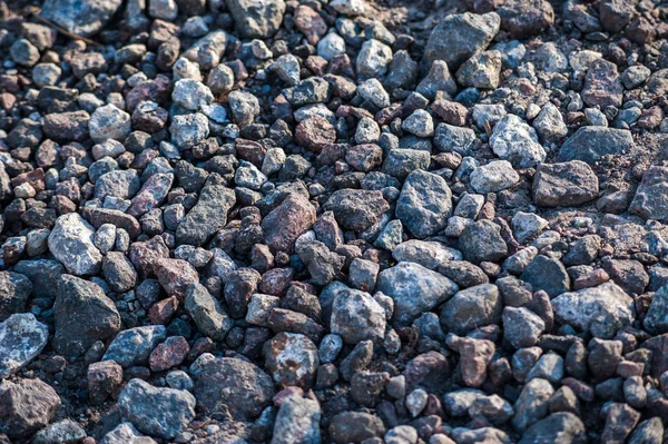 ezilmiş kayalar doku arka plan. Taşlar inşaat doku arka plan. Gri granit çakıl doku arka plan. üst görünüm.