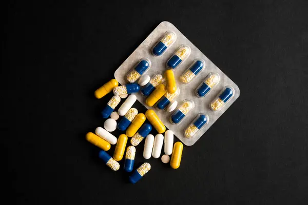 Different tablets, pills in foil blister packs, medications drug — Stock Photo, Image