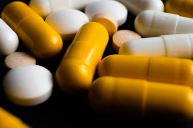 Different tablets, pills, medications drugs macro photo