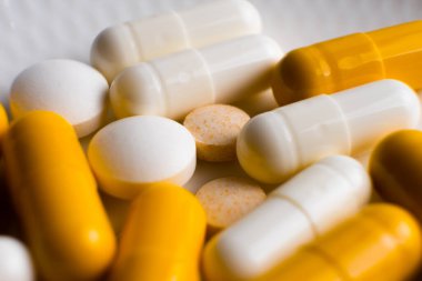 Different tablets, pills, medications drugs macro photo