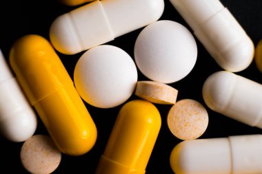 Different tablets, pills, medications drugs macro photo
