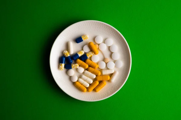 Different Tablets Pills Medications Drugs Green Background — Stock Photo, Image